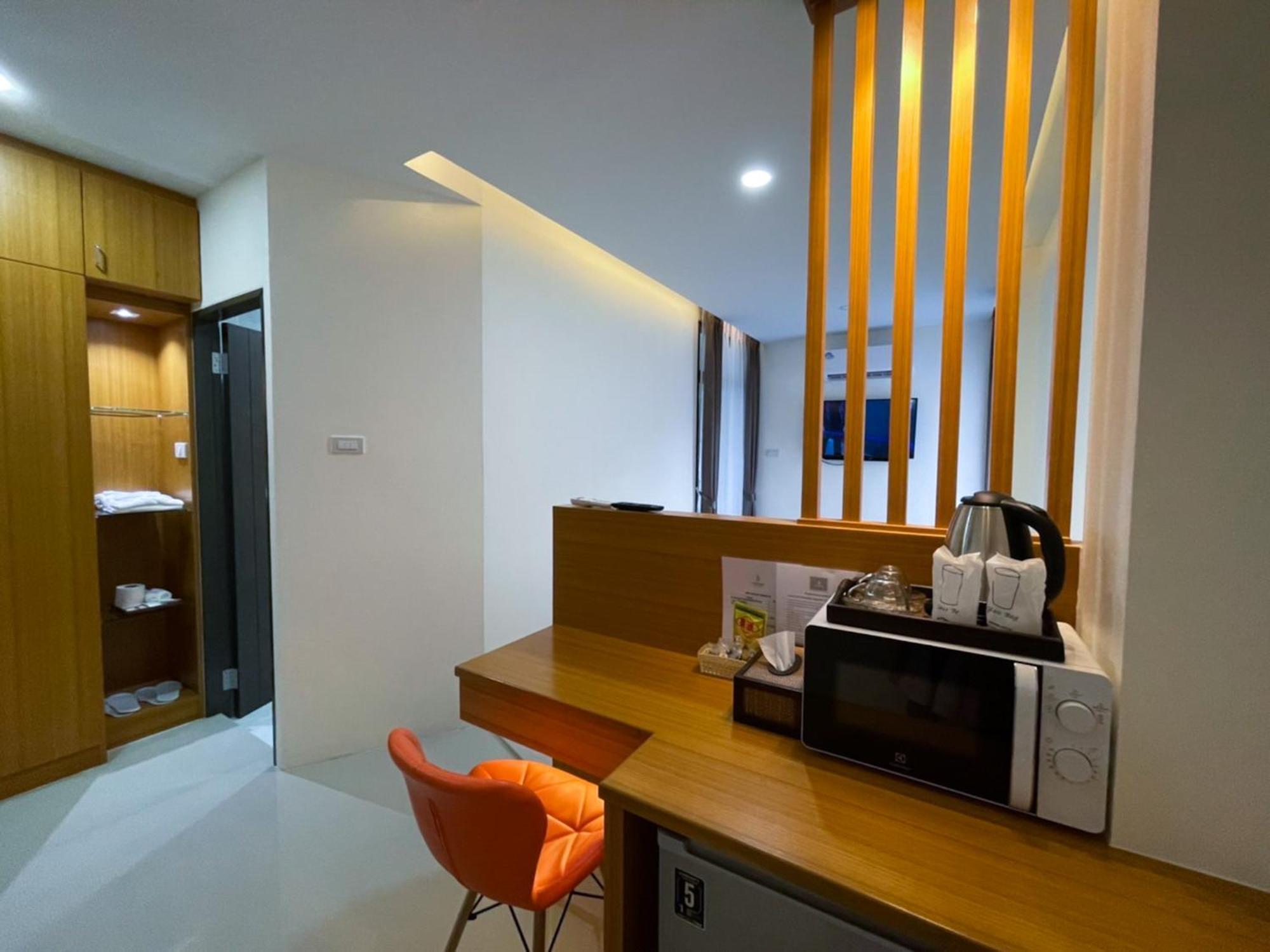 TJ Boutique Hotel Uthai Thani Chambre photo