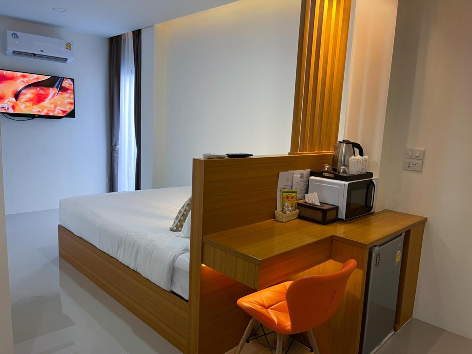 TJ Boutique Hotel Uthai Thani Chambre photo